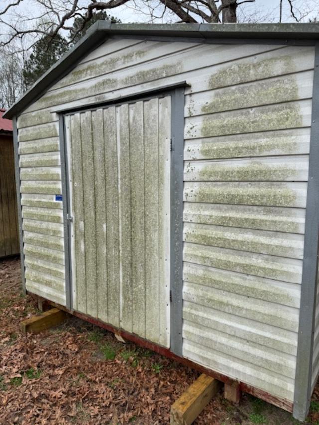 Mossy Steel Shed Cleaned in Cary, NC